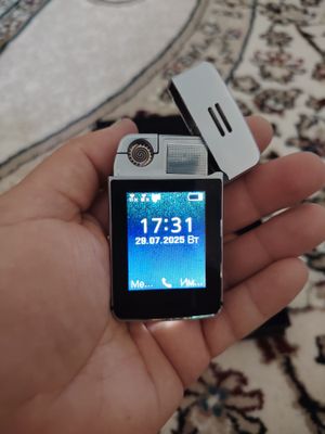 Срочно продаю мини телефон и Жажигалка
