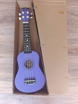 Новая укулеле (в коробке)