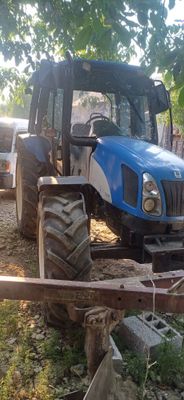 New Holland-100 yili 2005 yil