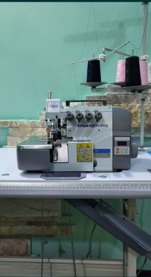 Продаю оверлог 4 х нитка новый Shanggong