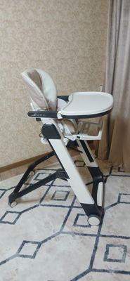 Фирменный стульчик для кормления