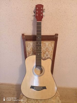 Gitara yangi holati ideal