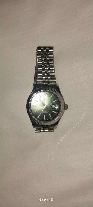ROLEX soati. Holati zo'r. Narxi 130000 ming. ROLEX soati. Holati zo'r. Narxi 130000 ming.