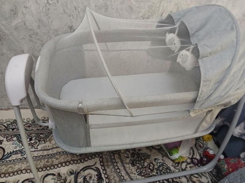 Muzikali tebranadigan bolalar belanchagi Muzikali tebranadigan bolalar belanchagi
