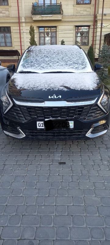 Автомобил KIA Sporteych