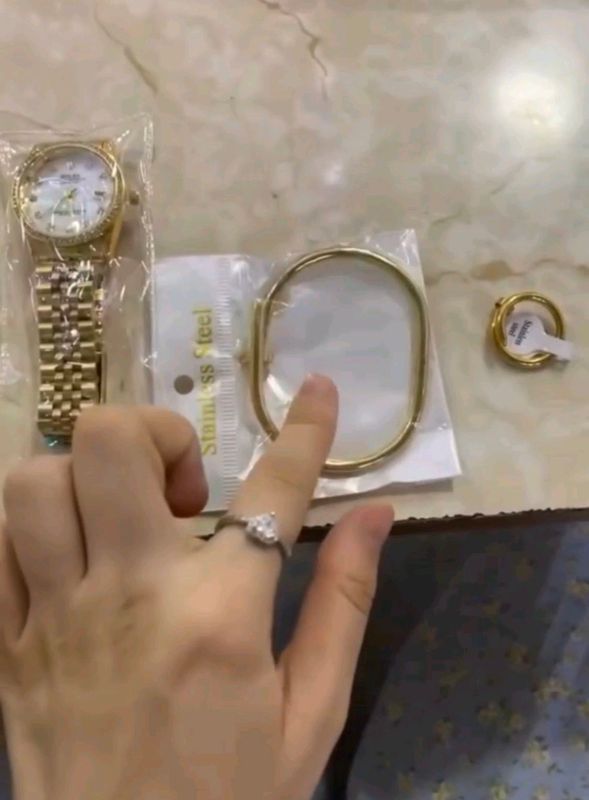 ROLEX VA CARTIER TO’PLAMI