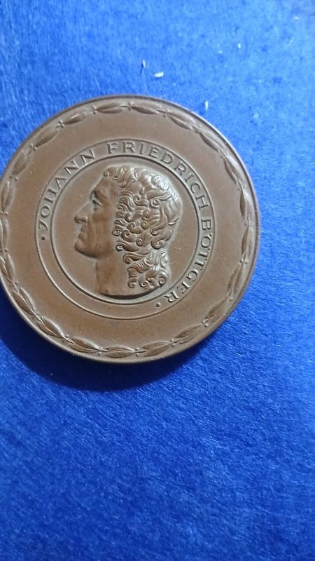 Фарфоровая медаль