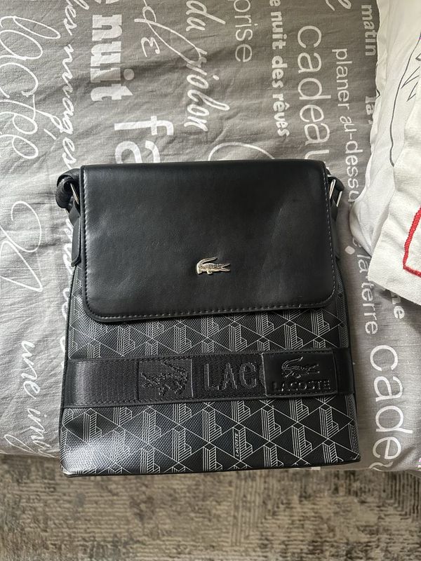 Сумка lacoste в новым состояний Сумка lacoste в новым состояний