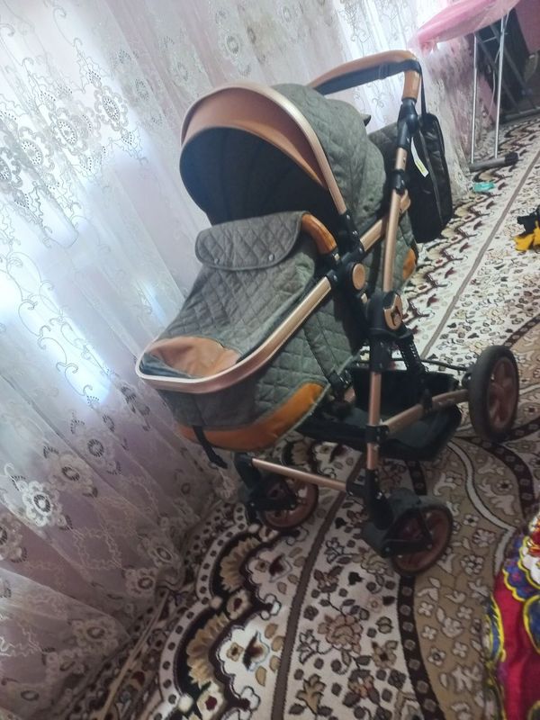 Bolalar uchun xolati yangi kolyaska Bolalar uchun xolati yangi kolyaska