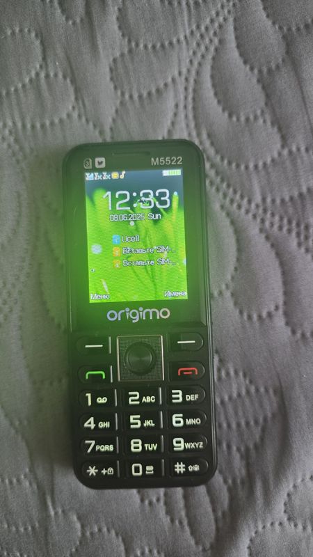 Новый телефон origimo M5522 Новый телефон origimo M5522