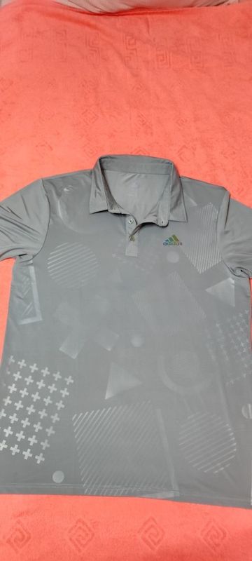 Майки поло Adidas. Производство Вьетнам. Размер 54 Майки поло Adidas. Производство Вьетнам. Размер 54