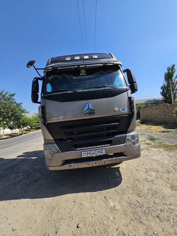 HOWO A7 + KOGEL прицеп Сотилади HOWO A7 + KOGEL прицеп Сотилади