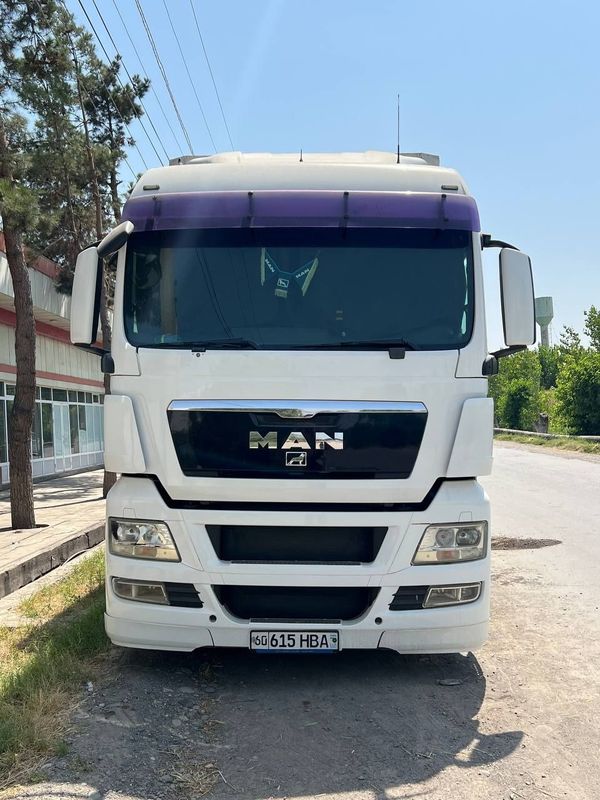 MAN TGX 18.440 + Kassbohrer прицеп Сотилади MAN TGX 18.440 + Kassbohrer прицеп Сотилади