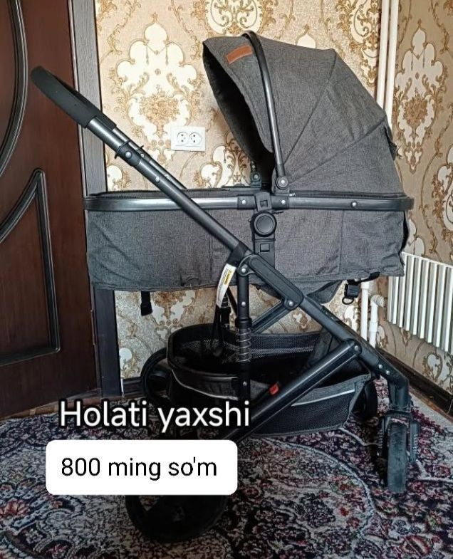 bolalar transfer kolyaskasi