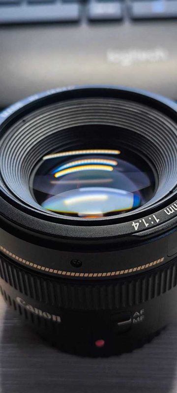 Объектив Canon EF 50mm f/1.4 USM в отличном состоянии Объектив Canon EF 50mm f/1.4 USM в отличном состоянии