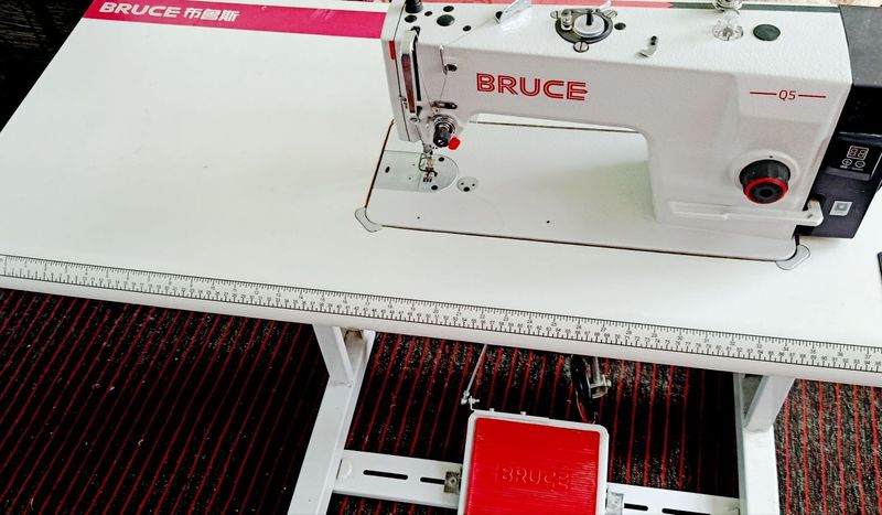 Bruce Q5 tikuv mashinasi holati yangi