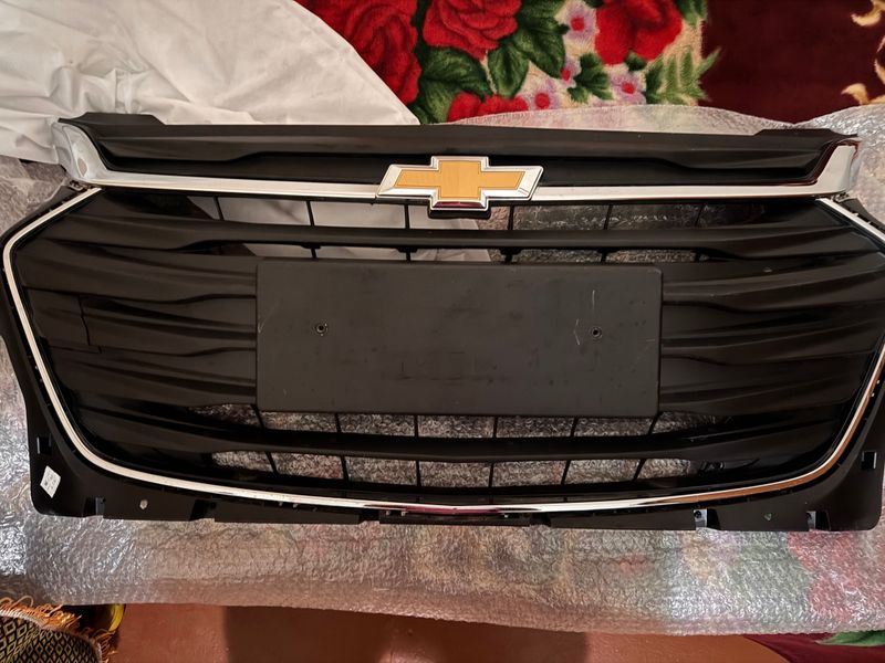 Передняя решетка на Chevrolet Onix Передняя решетка на Chevrolet Onix