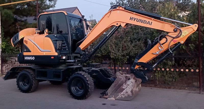 Услуги экскаватора.