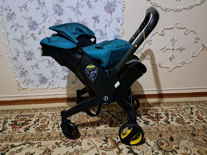Коляска-автокресло doona+ Коляска-автокресло doona+