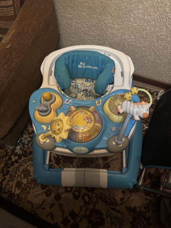 Детские ходунки с игрушками Детские ходунки с игрушками