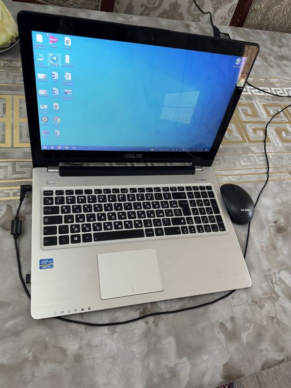 Ноутбук ASUS сотилади. Сенсор.Холати ало даражада.