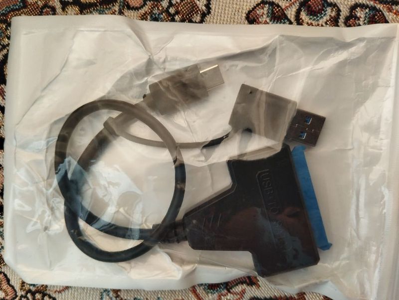 SATA adapter tape-C ва USB га чиқаради