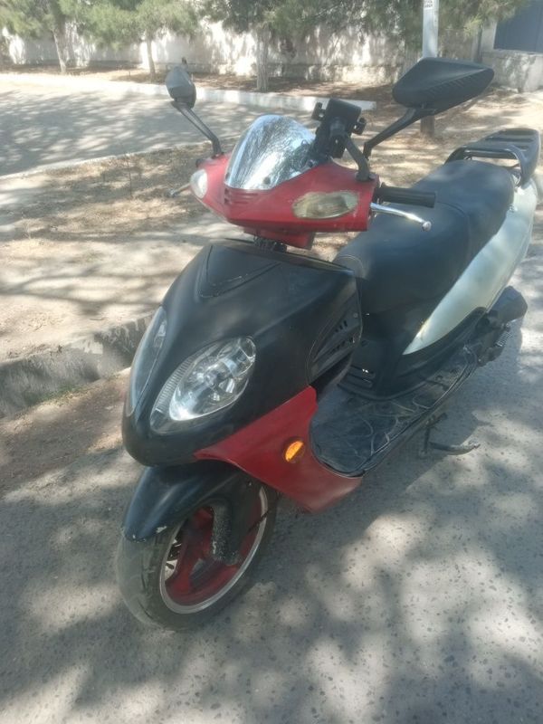 Kawasaki skuter firminniy yili 2016 Kawasaki skuter firminniy yili 2016