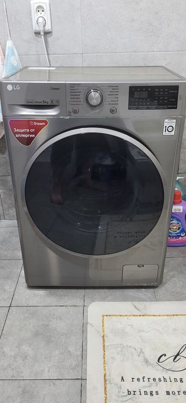 LG Direct Drive 6 kg sig'imli kir yuvish mashinasi ko'rinadi. LG Direct Drive 6 kg sig'imli kir yuvish mashinasi ko'rinadi.