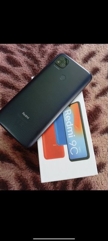 Redmi 9c idial ayol kishi tutgan holati idial Redmi 9c idial ayol kishi tutgan holati idial