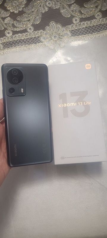 Xiaomi MI 13 Lite 5G 16/256Gb Black Igravoy Flagman Karobka Ideal Zor Xiaomi MI 13 Lite 5G 16/256Gb Black Igravoy Flagman Karobka Ideal Zor