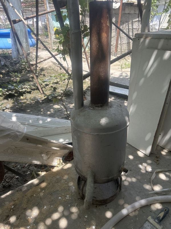Котелча газ балондан ясалган.