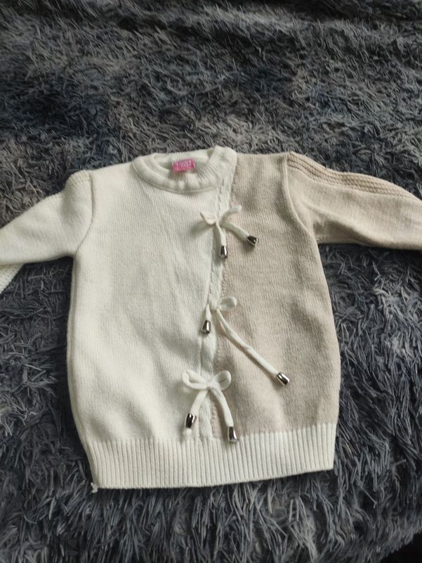 Теплая кофточка на девочку 7-8 лет Теплая кофточка на девочку 7-8 лет