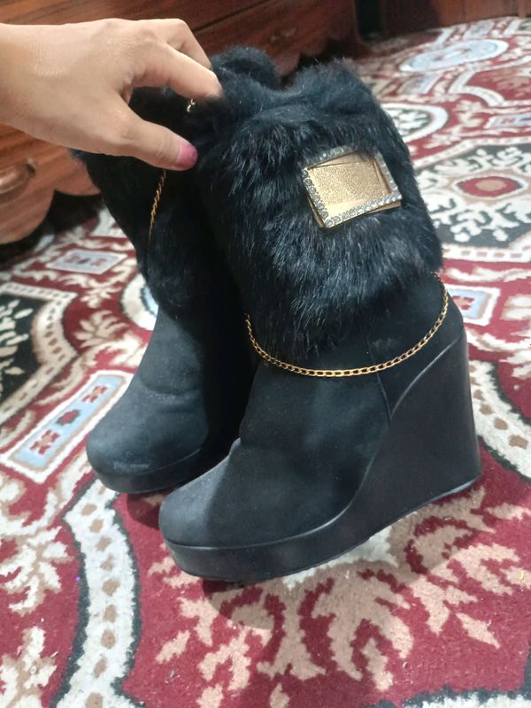 ayollar qishki oyoq kiyimi