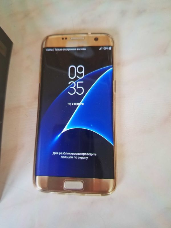 Телефон SAMSUNG Galaxy S7 edge. Цвет Gold. Телефон SAMSUNG Galaxy S7 edge. Цвет Gold.