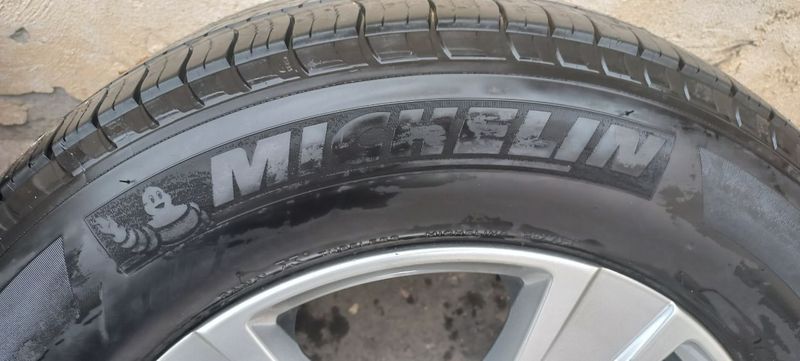 Michelin balon bu 18 P265/60 holati yaxshi .Diska Italiya arginal .