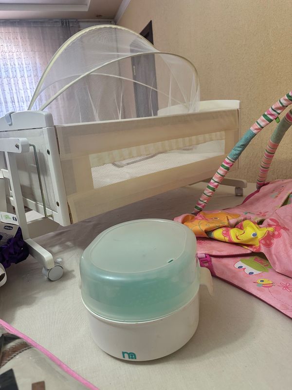 Стерилизатор бутылочек почти новый от mather care продам очень дешево Стерилизатор бутылочек почти новый от mather care продам очень дешево