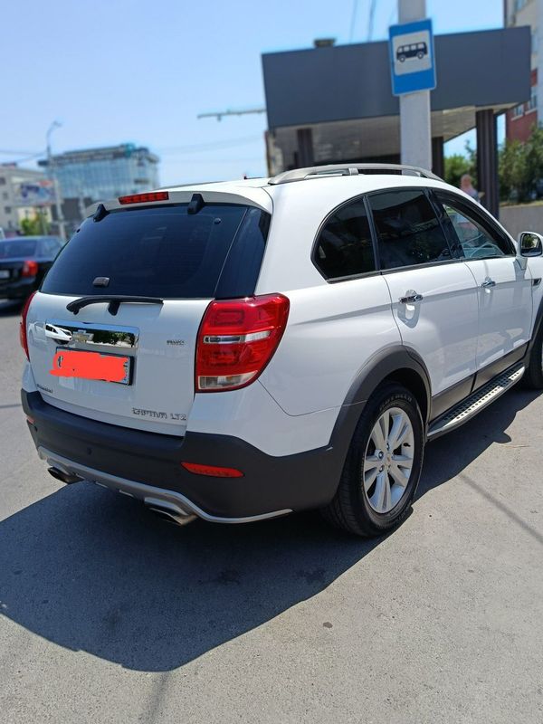 Captiva 4 qilingan 2012 yil kraskasi tozza rangi oq Captiva 4 qilingan 2012 yil kraskasi tozza rangi oq