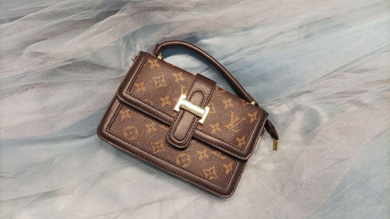 Сумка/клатч Louise Vuitton