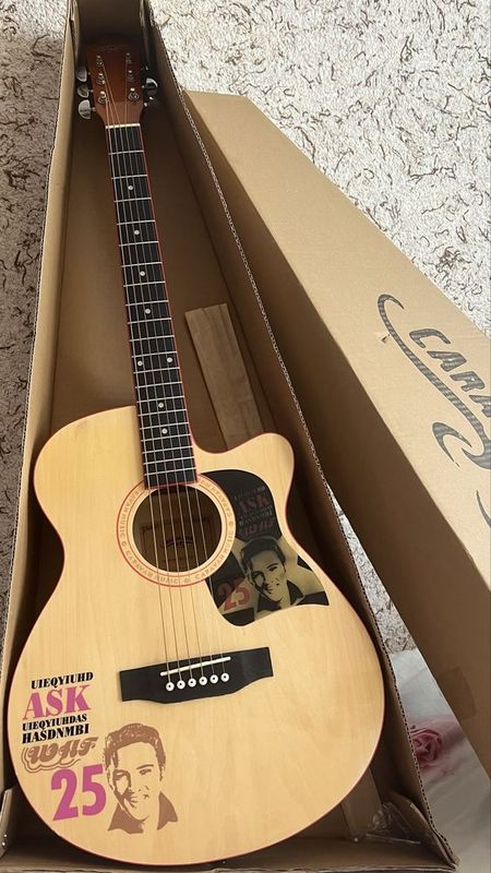 Gitara sotiladi yangi