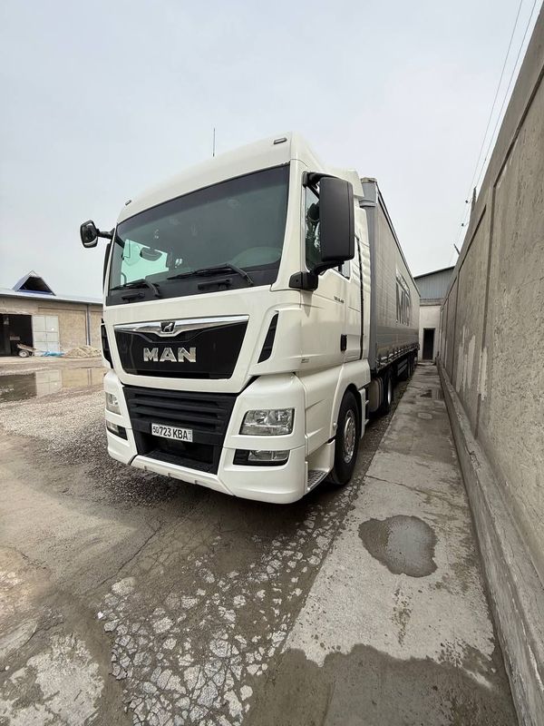 MAN TGX 18.460 + KOGEL прицеп Сотилади MAN TGX 18.460 + KOGEL прицеп Сотилади