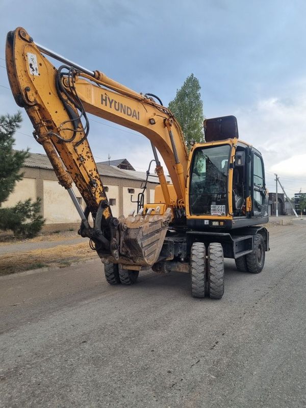 Hyundai R 140 w uzbda kam ishlagan