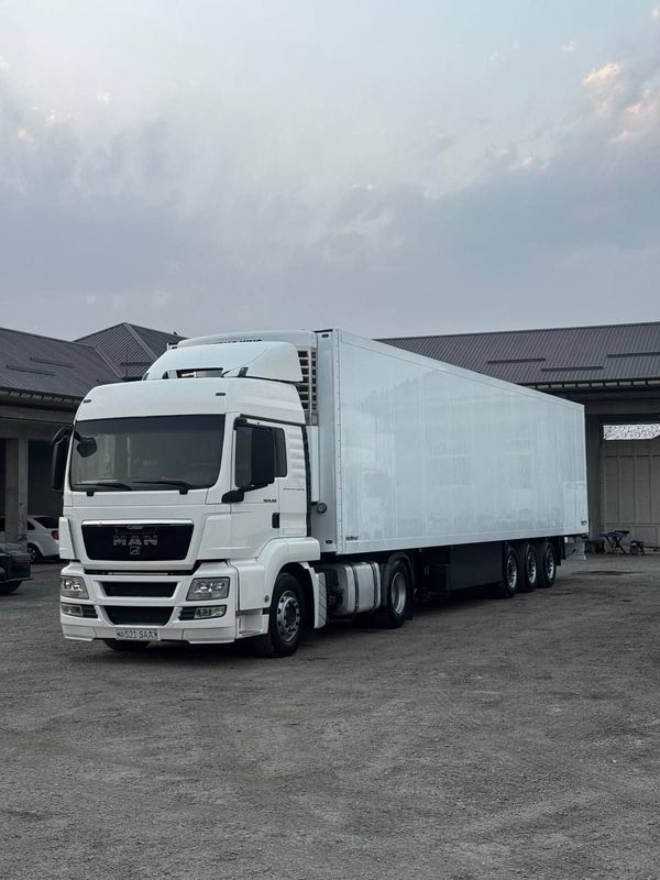 UZ MAN TGS 19.400 + SCHMITZ Реф Сотилади 2013 йил UZ MAN TGS 19.400 + SCHMITZ Реф Сотилади 2013 йил
