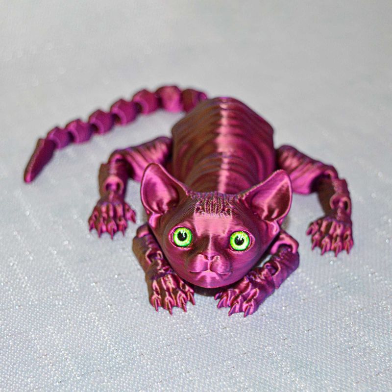 Котенок сфинкс подвижная игрушка Котенок сфинкс подвижная игрушка