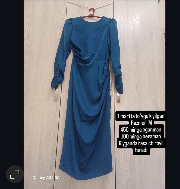 Modniy koʻylak Kiyganda rasa chiroyli turadi Modniy koʻylak Kiyganda rasa chiroyli turadi