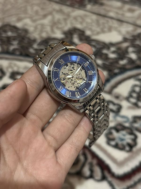 Tevise skeleton blue dial watch