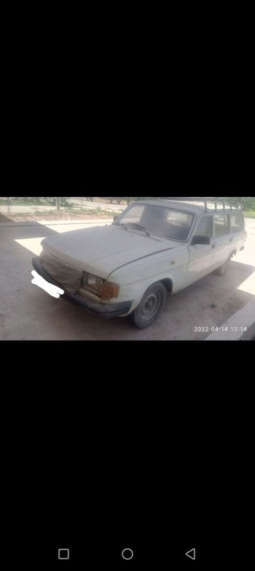 Gaz 310230 Volga kup urindiqli tiz yordam moshina.