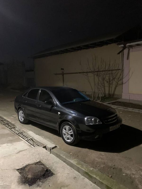 Lacetti 1.8 qora rang 2 poz