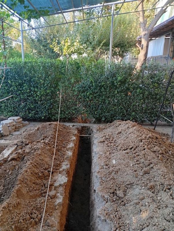 Transheya qazimiz kanalizatsiya suv kabel