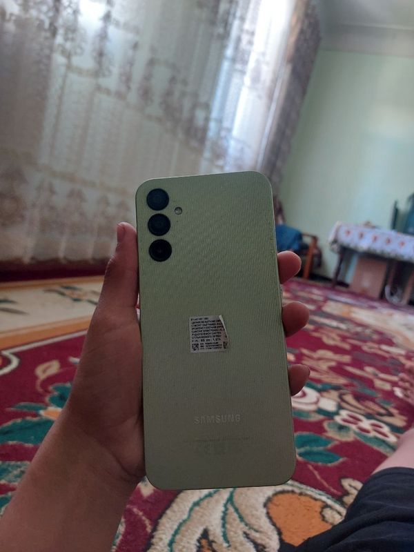 Samsung a14 garatya 1 jil