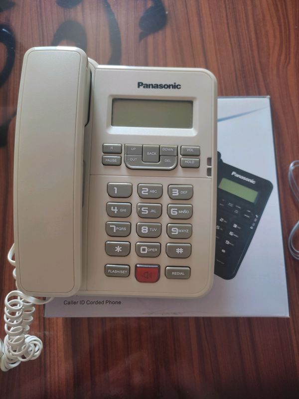Panasonlk домашний телефон. Новый